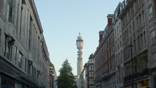 London in Lockdown BT Tower low angle shot looking up from street, sunrise Soho
