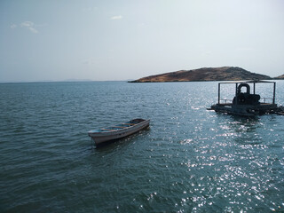 Northern Red Sea, Eritrea - January 25, 2021: Travelling around the vilages near Asmara and Massawa. An amazing caption of the sea with some boats over with grey sky.
