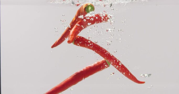 Boiling of red chili peppers in a restaurant