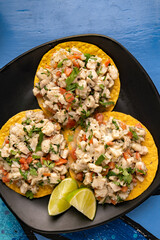 Mexican tortilla tostada with fresh ceviche seafood