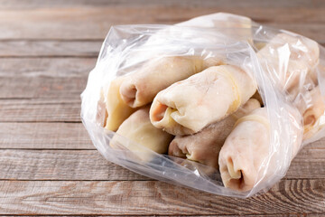 Frozen cabbage rolls. Semi-finished raw meat products are ready to cook. Minced meat wrapped in green cabbage leaves