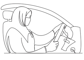 muslim woman driving a car