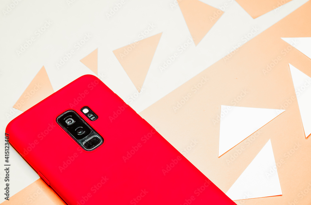 Aufkleber red mobile phone isolated on the white background with red triangular parts