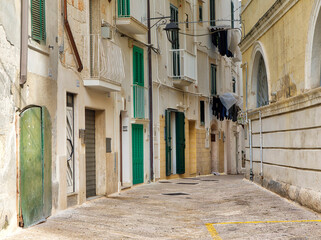 Fototapeta na wymiar Street and alleyways in the walled city of Monopoli.