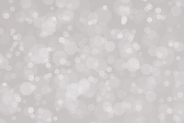 Bokeh background with circle pattern on grey colour.