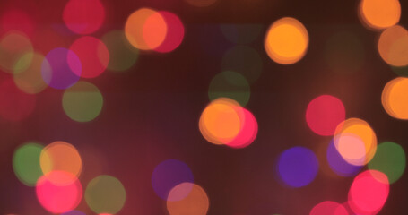 Obraz premium Colored bokeh abstract background. Decoration at Christmas holiday.