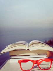 Open book outdoors. Reading