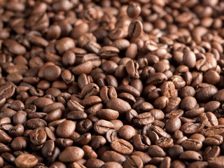 Macro photo of roasted arabica coffee beans.