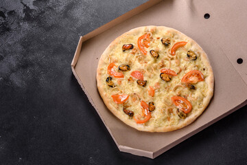 Fresh delicious pizza made in a hearth oven with shrimp mussels and other seafood