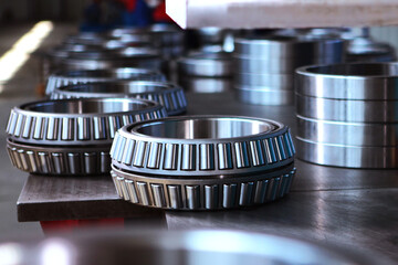 Ready-made large-diameter bearings. Metal products. Conveyor in the production of bearings.Heavy...