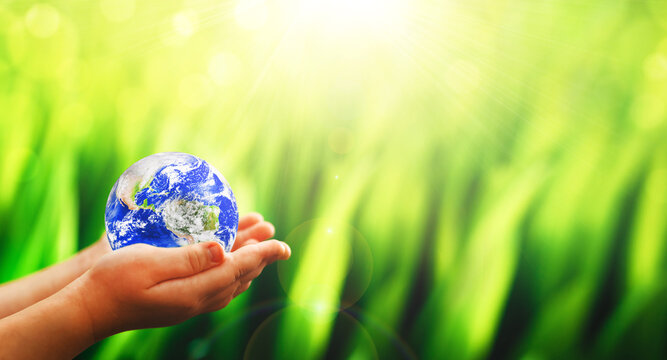 Earth planet in woman hands. 
Save and protection Earth. Concept of the Environment World Earth Day:  Elements of this image are furnished by NASA
