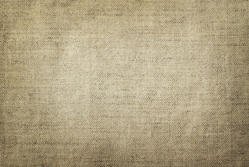 Fabric background. Natural linen, natural material. Puffy, beige, light with copy space.