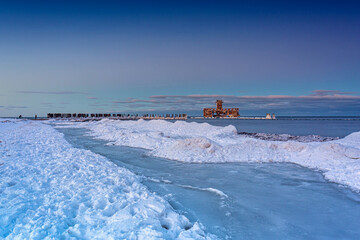 Frozen beach of the Baltic Sea in Babie Doły at sunset, Gdynia. Poland