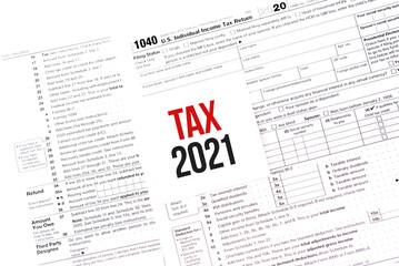 White Paper Note With Words TAX 2021 On Calendar