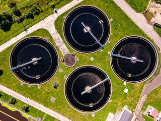 Aerial view of sewage treatment plant.  Industrial water treatment. Ecosystem and healthy...