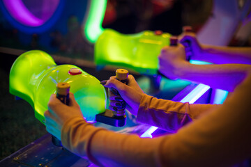 Woman playing games in playroom.