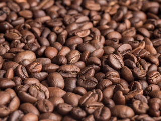 Macro photo of roasted arabica coffee beans.