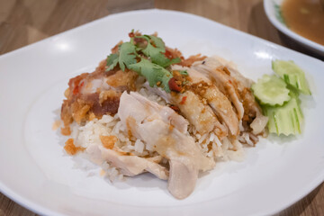 chopped steamed chicken and fried chicken on rice