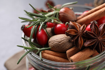 Obraz na płótnie Canvas Aroma potpourri with different spices in jar, closeup view