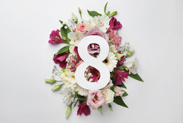 8 March greeting card design with beautiful flowers on white background, flat lay. International...