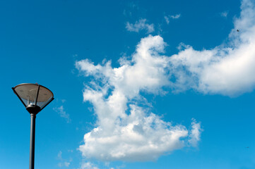 Street lamp and cloudy sky 