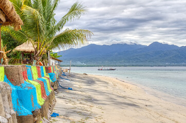 Low tide Island Indonesia. Gili Air 02.01.2017. View of Lombok Island. The vicinity of the Ferry Pier.