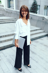 Young business woman in the city