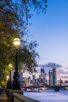 Victorian gaslamps in Westminster, Vauxhall Bridge, illuminated buildings in Nine Elms, London