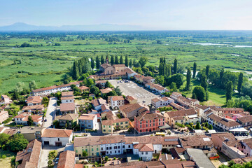 Fototapeta na wymiar Italy, Mantova, Le Grazie village, Basilica and square, Mincio river valley in the background