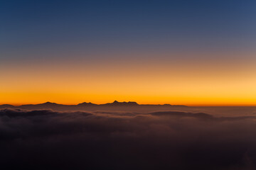Fototapeta na wymiar Sunrise over Sri Pada (Adams peak), Sri Lanka