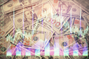 Multi exposure of forex chart drawing over us dollars bill background. Concept of financial success markets.