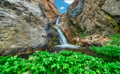 Beautiful landscape of a small waterfall in Garrapata State Park, on the hiking trails of Point Soberanes, California, USA
