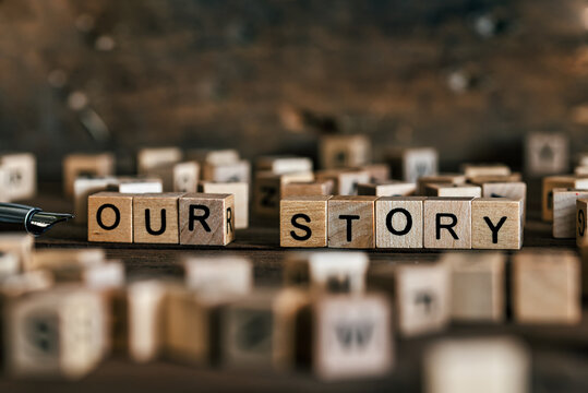 Tell Us Your Story Concept With Wooden Letters Cubes