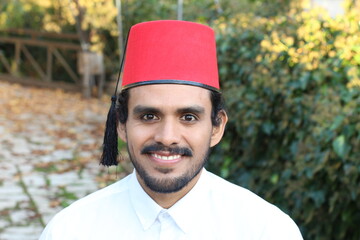 Middle Eastern man wearing classic fez hat