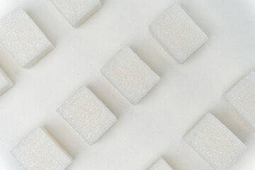 sugar cubes glucose ingredient calories energy light background