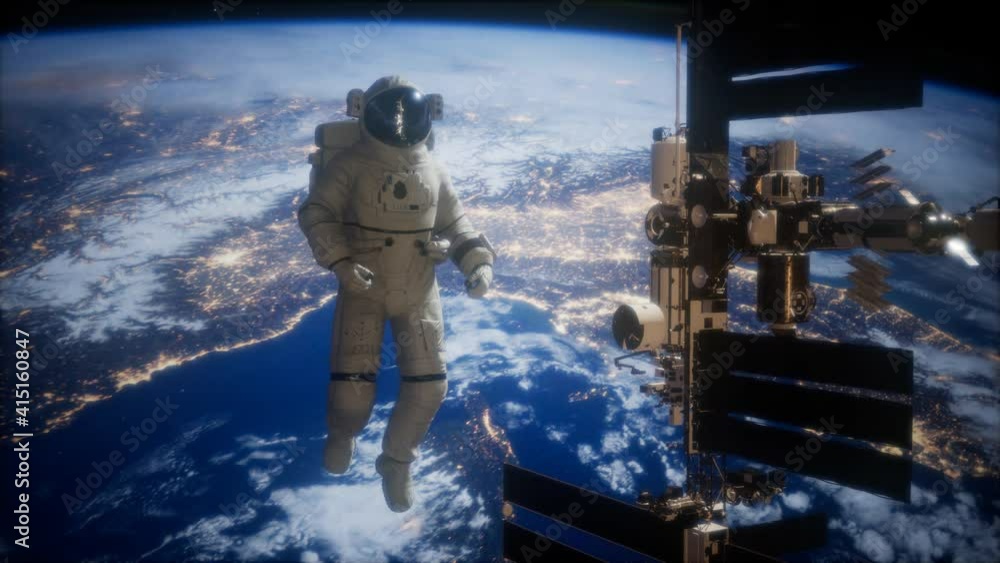 Wall mural international space station and astronaut in outer space over the planet earth. elements of this ima