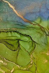 Alcohol ink art.Mixing liquid paints. Modern, abstract colorful background, wallpaper. Marble texture.Translucent colors