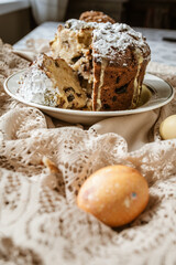 Sliced Easter cake and Easter eggs