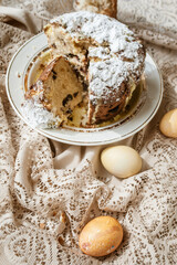 Sliced Easter cake and Easter eggs