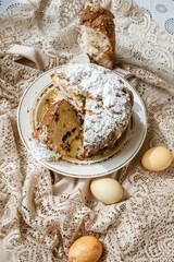 Sliced Easter cake and Easter eggs