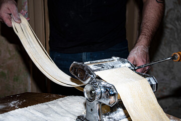 Fresh pasta  making   with  original pasta  machine   hand  rolled 