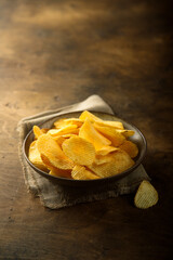 Traditional potato chips in the bowl