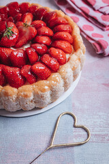 Delicious fresh Charlotte cake with strawberries