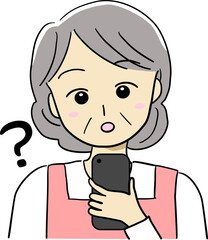 スマホを見て疑問をもつ高齢女性