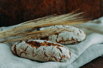 homemade rye bread on a dark background