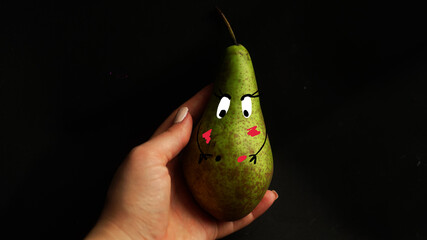 pear in hand