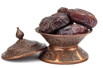 Dates on a bronze plate isolated