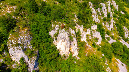 view from the hill with the green valley and the hollow rocks without trees