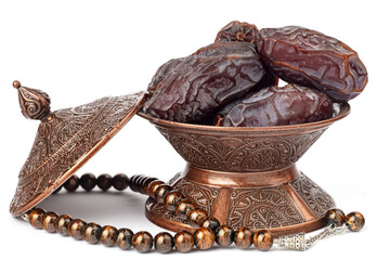 Dates on a bronze plate isolated
