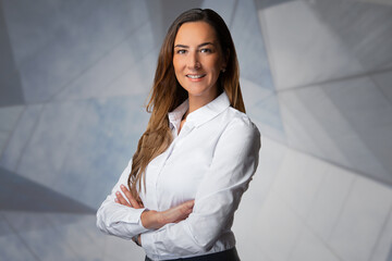  Successful mature business woman looking at camera